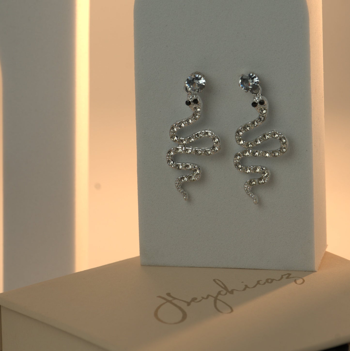 Chasing Snakes (Silver)
